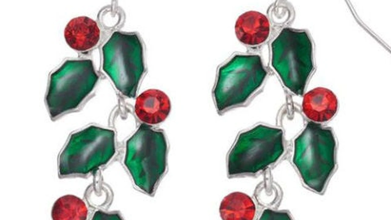 blue bowl of black bean beef tortilla soup on a board with cilantro and shredded cheese in background