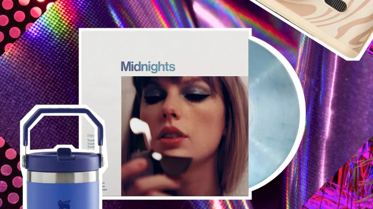 blue bowl of black bean beef tortilla soup on a board with cilantro and shredded cheese in background